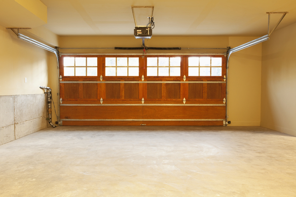 Empty Residential Garage with Wooden Door garage plans, garage layout ideas, garage design, garage remodel, garage transformation, garage conversion ideas