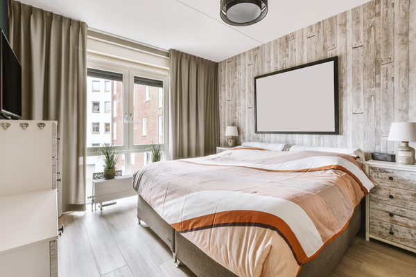 Modern bedroom showcasing king size bed dimensions, neutral tones and cozy bedroom design