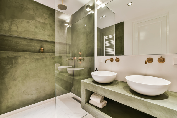 Elegant bathroom with marble walls, vessel sinks, and walk-in shower, perfect for bathroom renovation and tile floor and decor near me searches