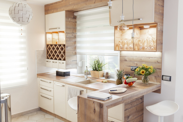 Contemporary cool small kitchen with wood accents and seating