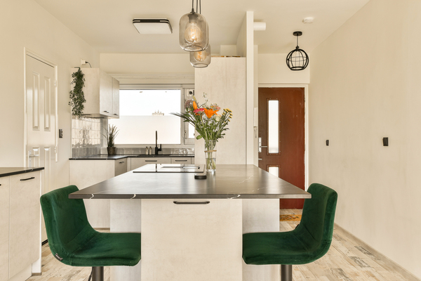 housedecorideas.net enhancing your home with a contemporary 2-storey house design minimal kitchen with green bar stools Minimalist kitchen island with green stools from housedecorideas.net enhancing your home with a contemporary 2-storey house design inspiration