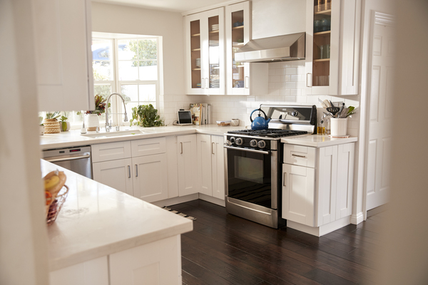 kitchen renovations plans modern family kitchen with white cabinetry and dark wood flooring Bright family kitchen with white cabinets and wood flooring for kitchen renovations plans inspiration