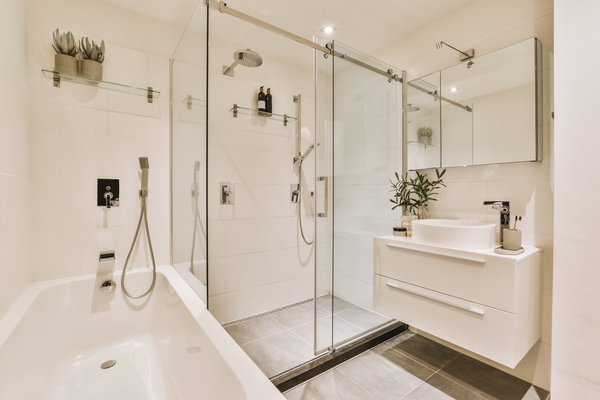 Sleek newbathroomstyle showcasing a spa-inspired bathroom remodel solutions with dual fixtures