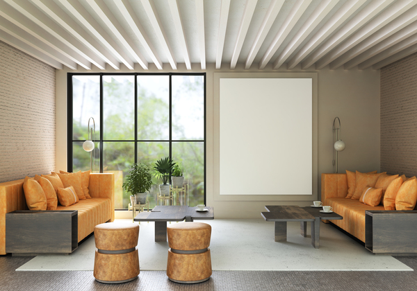 Interior of a modern living room with floor-to-ceiling windows for sale and neutral decor